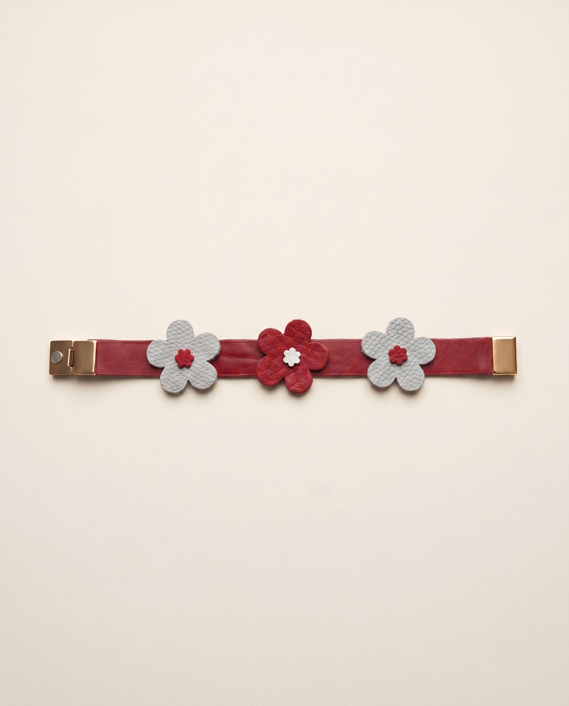 Handmade red leather daisy bracelet with champagne gold magnetic clasp
